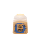 Small pot of tan Ungor Flesh hobby paint with a white screw cap and blue-and-tan label. The label reads “CITADEL,” “LAYER,” and “UNGOR FLESH.”
