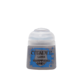 A small grey Citadel paint pot with a white flip-top lid and blue label. The label reads “CITADEL,” “LAYER,” and “WARPFIEND GREY.”