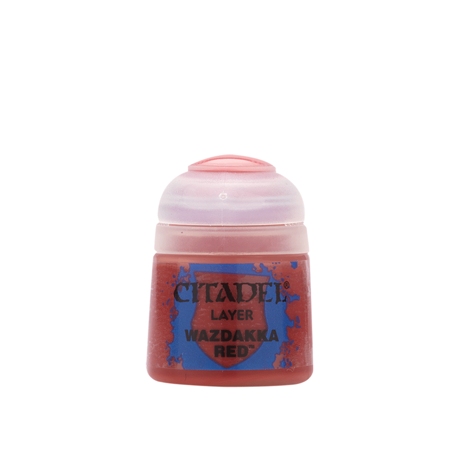 Small red paint pot shown upright against a plain white background, with a pale pink translucent flip-top cap and a blue-and-red front label reading “CITADEL,” “LAYER,” and “WAZDAKKA RED.”
