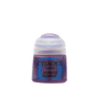 A squat purple Citadel paint pot stands centered against a solid green background, with a rounded pale lavender cap and a blue-and-purple splatter label. The label reads “CITADEL,” “LAYER,” and “XEREUS PURPLE.”