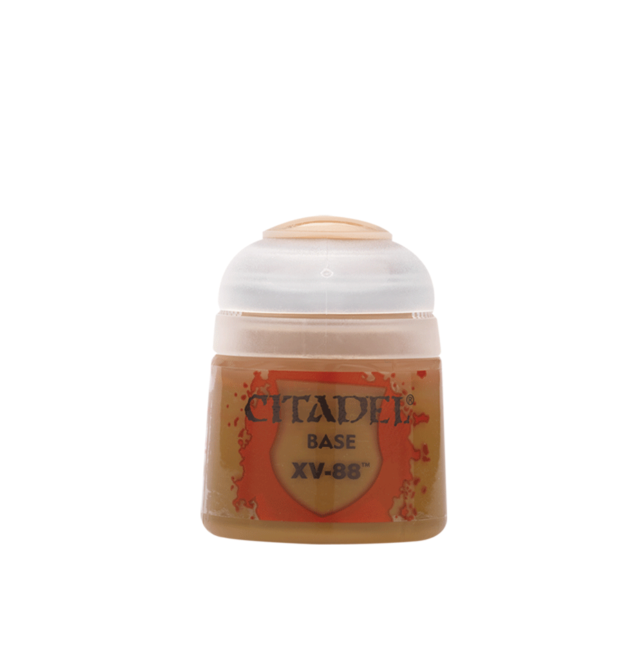 A small squat paint pot with a translucent white cap and an ochre-brown body, shown upright against a plain green background. Its orange-red label reads “CITADEL,” “BASE” and “XV-88.”