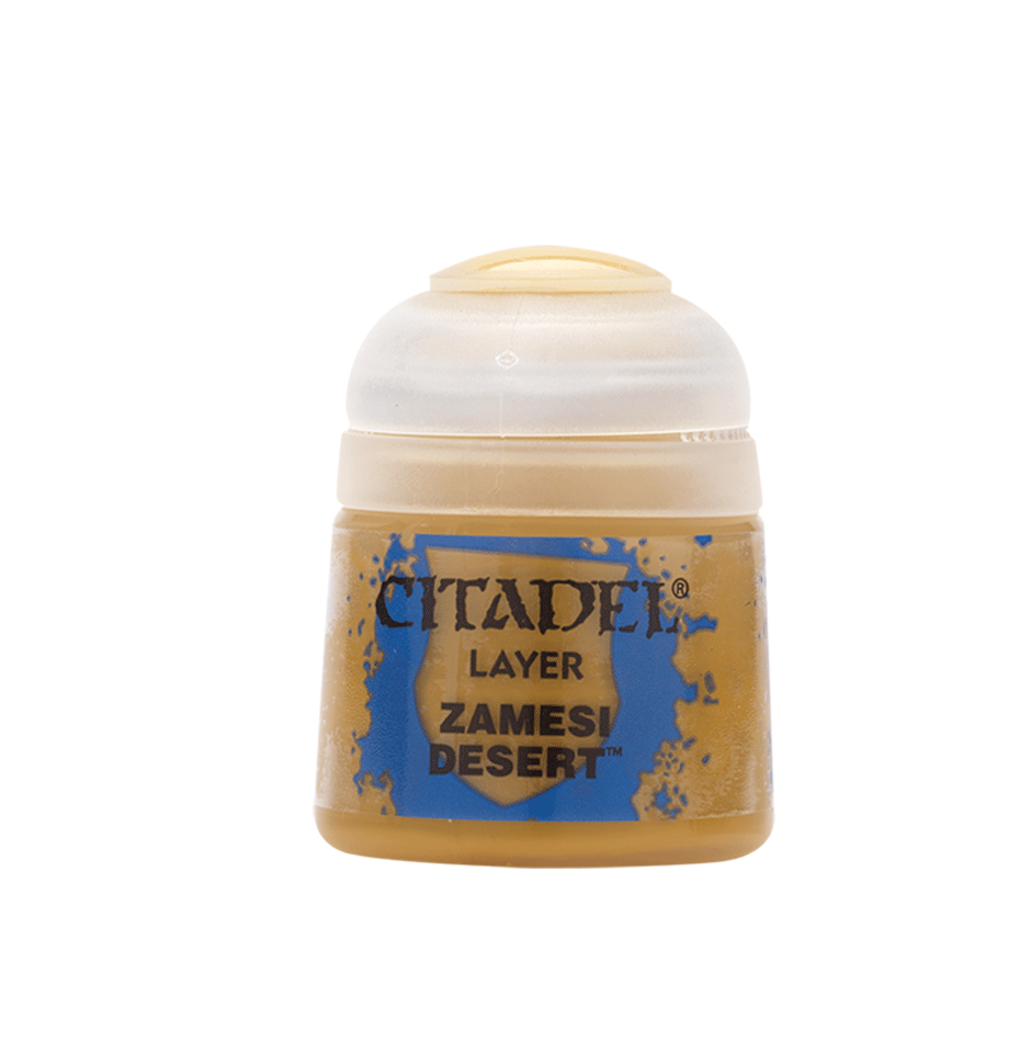A small ochre-colored Citadel paint pot with a rounded white cap, shown upright against a plain light background. Its blue-and-tan label reads “CITADEL,” “LAYER,” and “ZAMESI DESERT.”