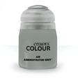 A single squat, grey paint bottle with a rounded cap is shown upright against a white background. Its front label reads “CITADEL COLOUR,” “AIR,” and “ADMINISTRATUM GREY.”