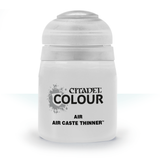 A single white plastic bottle with a rounded screw cap, shown upright against a plain white background. Its black label reads “CITADEL COLOUR,” “AIR,” and “AIR CASTE THINNER.”