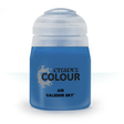 A small blue paint bottle with a rounded white cap stands upright against a white background. Its front label reads “CITADEL COLOUR,” “AIR,” and “CALEDOR SKY.”