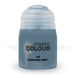 A squat bottle of blue-gray Citadel air paint with a large pale translucent cap, shown upright against a white background. The label reads “CITADEL COLOUR,” “AIR,” and “FENRISIAN GREY.”