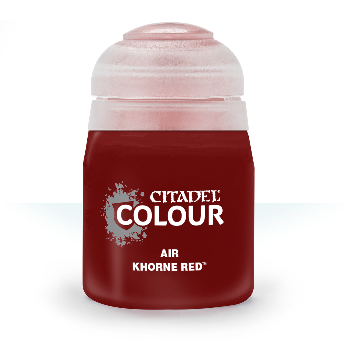 A squat dark red paint bottle stands upright against a white background, with a pale translucent cap and label text reading “CITADEL COLOUR,” “AIR,” and “KHORNE RED.”