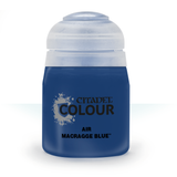 A squat, dark blue paint bottle with a rounded white cap is shown upright against a white background. Its label reads “CITADEL COLOUR,” “AIR,” and “MACRAGGE BLUE.”