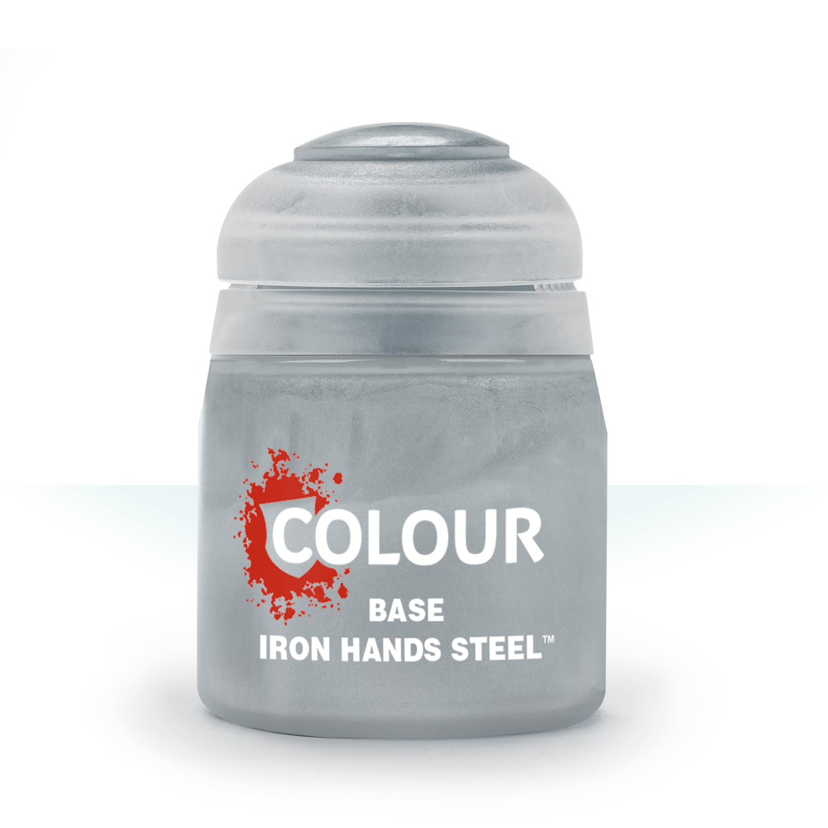 A squat gray paint pot with a rounded gray lid, shown upright against a white background. Its label has a red paint-splatter graphic behind the white text “COLOUR,” with “BASE” and “IRON HANDS STEEL” below.