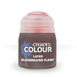 A small Citadel paint pot stands against a white background, with a dark brown body and pale pink cap. The label reads “CITADEL COLOUR,” “LAYER,” and “BLOODREAVER FLESH.”