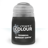 A squat black Citadel paint pot with a wide translucent gray cap, shown upright against a white background. Its label reads “CITADEL COLOUR” and “TECHNICAL MORDANT EARTH.”