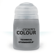 A squat, translucent gray paint pot with a wide white flip-top lid is shown upright against a white background. Its front label reads “CITADEL COLOUR” and “TECHNICAL STORMSHIELD.”