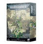 Warhammer 40,000 miniature box showing the silver C’Tan Shard of the Void Dragon floating above a rocky base, surrounded by bright green energy and a spiked halo. The narrow side panel shows a partial close-up; front text reads “WARHAMMER 40,000” and “C’TAN SHARD OF THE VOID DRAGON.”