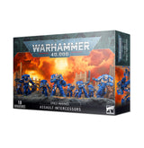 Box for a set of blue-armored Space Marine miniatures, shown from the front and right side against a white background. The artwork depicts warriors on an orange, fiery battlefield; the front reads “WARHAMMER 40,000,” “SPACE MARINES” and “ASSAULT INTERCESSORS.”