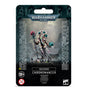 Front of a black Warhammer 40,000 package showing a skeletal sci-fi Necrons Chronomancer miniature with a staff, teal and pink accents, and trailing cables. The package reads “WARHAMMER 40,000” and “NECRONS CHRONOMANCER.”