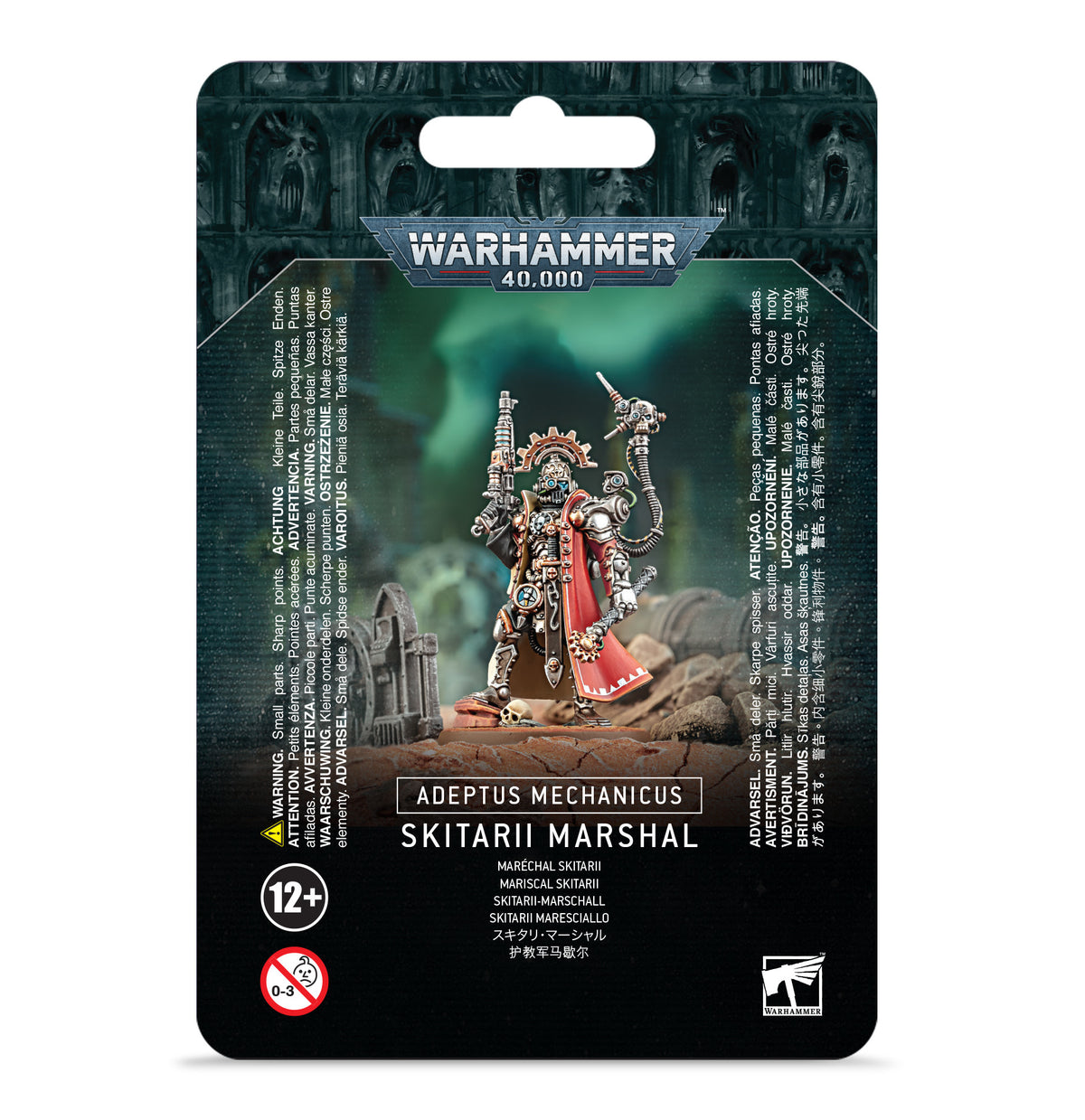 Black hanging-card packaging for a Warhammer 40,000 miniature, with artwork of an armored, hooded Skitarii figure carrying weapons and wearing a red cape. The package reads “ADEPTUS MECHANICUS” and “SKITARII MARSHAL,” with a 12+ age mark.