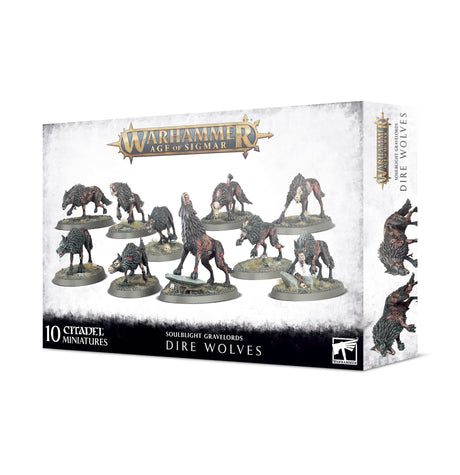 A white and gray Warhammer: Age of Sigmar Dire Wolves box shows ten dark, snarling wolf miniatures on round bases across the front, with wolf artwork on the side. The box reads “WARHAMMER AGE OF SIGMAR,” “10 CITADEL MINIATURES,” and “SOULBLIGHT GRAVELORDS DIRE WOLVES.”