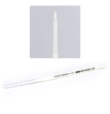 A white Citadel brush lies diagonally with a clear protective cap over its handle end and gray lettering reading “CITADEL COLOUR” and “STC BASE M” beside a barcode. An inset close-up shows its short, rounded white bristles.