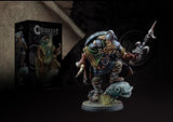 Painted Jarl fantasy warrior miniature in a crouched, turning pose, wearing layered armor in muted green, blue, and bronze and raising a long blade. It stands on a round scenic base, with a dark product box behind it bearing the readable title “CONQUEST.”