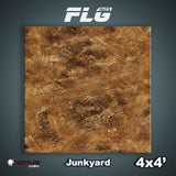 Square gaming mat shown from above, printed with a mottled brown junkyard terrain design of dirt, debris and tire tracks. The image includes the text “FLG,” “Junkyard” and “4x4’.”