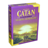 Purple and yellow Catan expansion game box shown upright at an angle, with a sunset landscape and small figures on the front. The cover reads “CATAN,” “5-6 PLAYER EXTENSION,” and “TRADERS & BARBARIANS.”