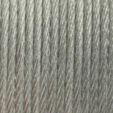 Close-up of many thin gray, metallic-looking strands running vertically in a dense, slightly twisted bundle, showing the cable’s fine texture.