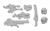 Warcaster: Dusk Wolf A weapon pack components arranged separately on a white background: several gray miniature guns and weapon parts, including a long vertical piece, with two rounded cortex components at the right. The parts are unpainted.