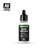 A white bottle of satin varnish stands upright against a white background, with a tall black ribbed pointed cap and black label with a green stripe. The label reads “SATIN VARNISH” and “100% ACRYLIC RESIN”; a Vallejo logo appears at upper left.