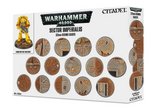 White box for round miniature bases, printed with brown, gray and orange industrial sci-fi base designs and a yellow armored figure illustration at left. The front reads “WARHAMMER 40,000,” “SECTOR IMPERIALIS” and “32MM ROUND BASES.”