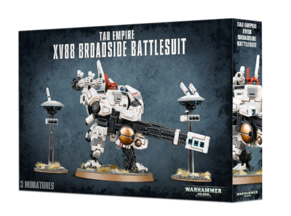 Box for the Tau Empire XV88 Broadside Battlesuit miniatures, showing a white and gray armored mech with orange details and a long gun, flanked by two small hovering drones on stands. The box reads “TAU EMPIRE XV88 BROADSIDE BATTLESUIT” and “3 MINIATURES.”