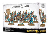 Box for Seraphon Saurus Guard miniatures, showing a group of blue-scaled reptilian warriors with spears and decorated shields on round bases. The front reads “SERAPHON SAURUS GUARD” and “15 CITADEL MINIATURES,” with “WARHAMMER AGE OF SIGMAR” logos; the right side shows more figures.