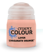 Small peach-orange paint pot with a rounded pale lid, shown upright against a light background. Its front label has a blue splatter graphic and the text “CITADEL COLOUR,” “LAYER,” and “LUGGANATH ORANGE.”