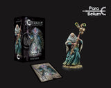 A bearded shaman miniature in teal robes and a fur mantle holds a tall staff on a round base, beside its black box and illustrated character card. The box reads “CONQUEST” and “SHAMAN,” with a “Para Bellum” logo above.