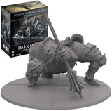 A large gray, unpainted armored beast miniature crouches on an oval base, with a long-handled weapon beside it; its expansion box is behind it, labeled “VORDT OF THE BOREAL VALLEY EXPANSION” and “DARK SOULS THE BOARD GAME.”