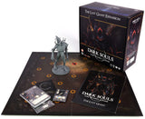 The Dark Souls: The Last Giant board game expansion is displayed with a gray giant miniature on a dark board marked by orange circles, beside cards, a booklet and a black illustrated box. The box reads “THE LAST GIANT EXPANSION” and “DARK SOULS THE BOARD GAME.”