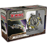 Angled view of a Star Wars X-Wing miniature game box, showing the front and left side. The front features a gray starship with yellow accents in an inset and flying through space, with the text “STAR WARS X-WING MINIATURE GAME” and “SHADOW CASTER.”