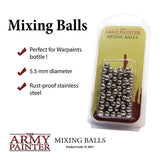 A clear blister pack holds rows of shiny metal mixing balls against a yellow-and-brown card. The image reads “Mixing Balls” and “THE ARMY PAINTER,” with checkmarked callouts for Warpaints bottles, 5.5 mm diameter and rust-proof stainless steel.