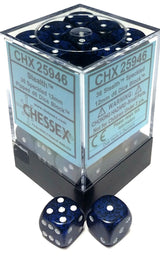 Dark navy and black speckled six-sided dice with white pips are displayed in a clear cube with a black base, with two loose dice in front. The cube labels read “CHX 25946,” “Stealth,” and “CHESSEX.”