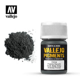 A jar of dark slate grey pigment with a white ribbed cap stands beside a mound of loose charcoal-grey powder. The label reads “VALLEJO PIGMENTS” and “Dark Slate Grey,” with the Vallejo logo above.