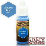 A small bottle of Electric Blue hobby paint stands upright with a white dropper cap and a blue-and-gold label reading “THE ARMY PAINTER WARPAINTS” and “Electric Blue.” A blue hexagon swatch at upper left reads “Electric Blue WP1113,” with “THE ARMY PAINTER” logo at lower right.