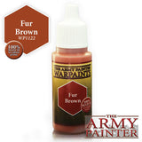 A small dropper bottle of brown paint with a white ribbed cap and yellow-and-black label reading “THE ARMY PAINTER WARPAINTS” and “Fur Brown.” A matching brown color swatch and “100% MATCH” badge appear beside it, with The Army Painter logo below.