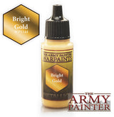 A small bottle of gold hobby paint with a black dropper cap and a gold-and-black label reading “THE ARMY PAINTER WARPAINTS” and “Bright Gold.” A matching gold hexagon marked “Bright Gold WP1144” appears at upper left, with “THE ARMY PAINTER” logo at lower right.