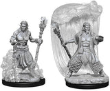 Two unpainted gray Water Genasi druid miniatures on black round bases: one stands amid swirling water with a staff, while the other holds a staff and extends a hand before a large flowing, water-like backdrop.